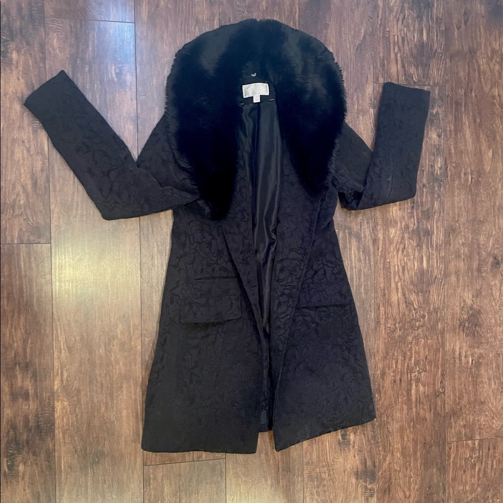 Black coat with faux fur lining on neck